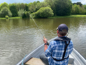 Flyfishing to a rising reservoir trout