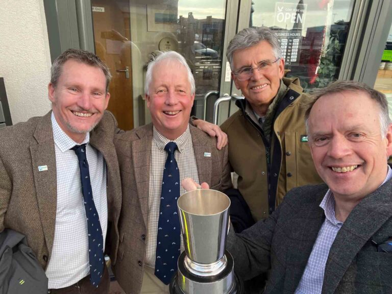 4 S&T Wessex fishermen one holding a silver cup